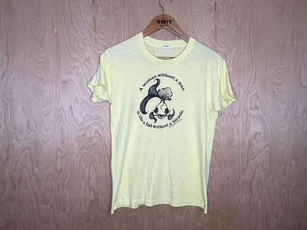 1976 Seattle National Organization for Women “A woman without a man is like a fish without a bicycle” - Medium